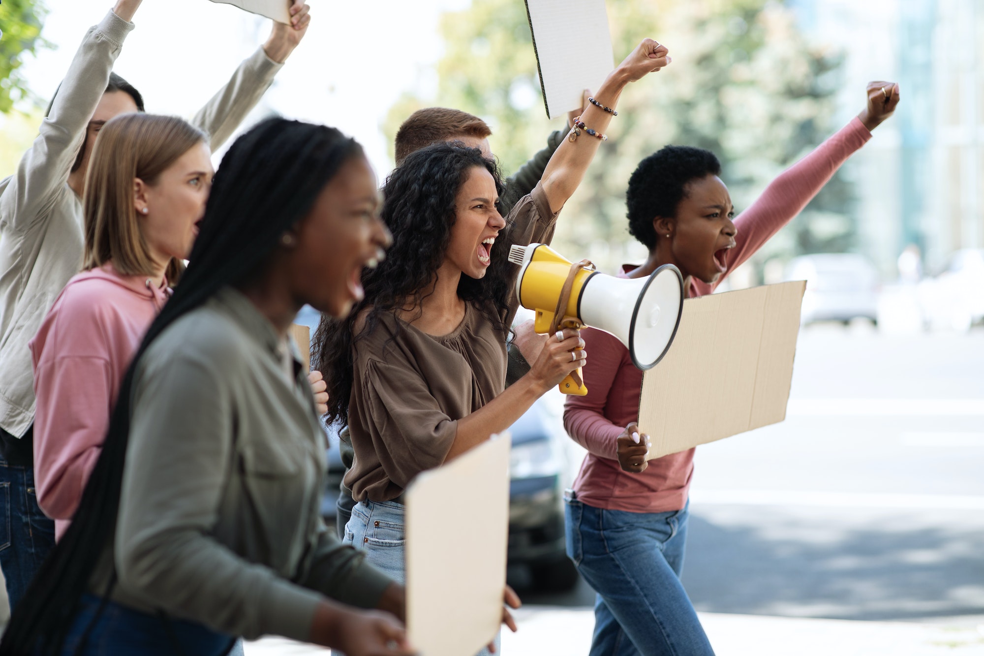 Active young people making strike on the street