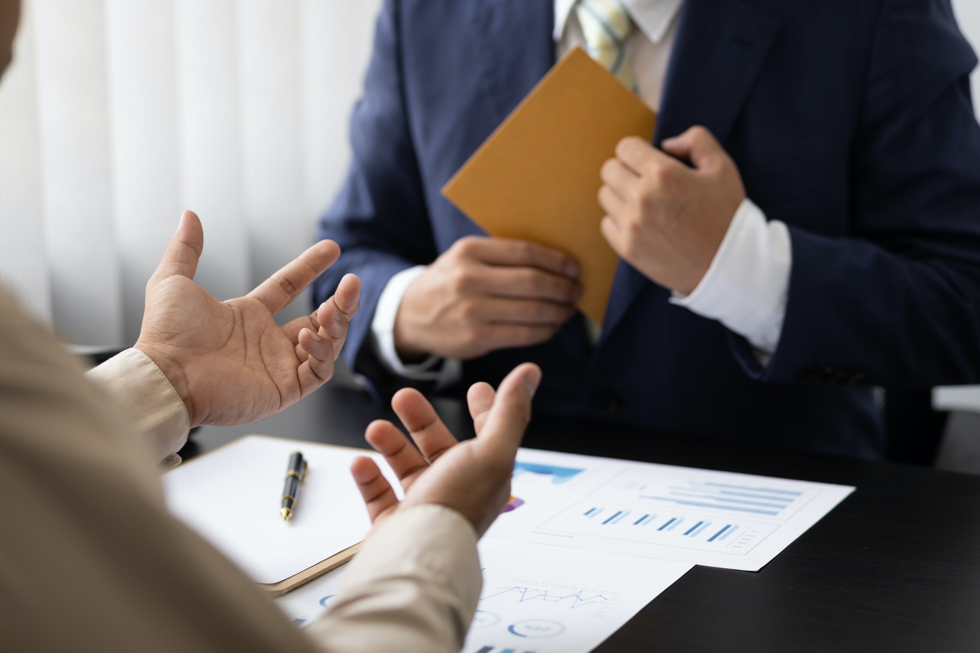 Business people get paid wages or salaries. Bribery signing concept.