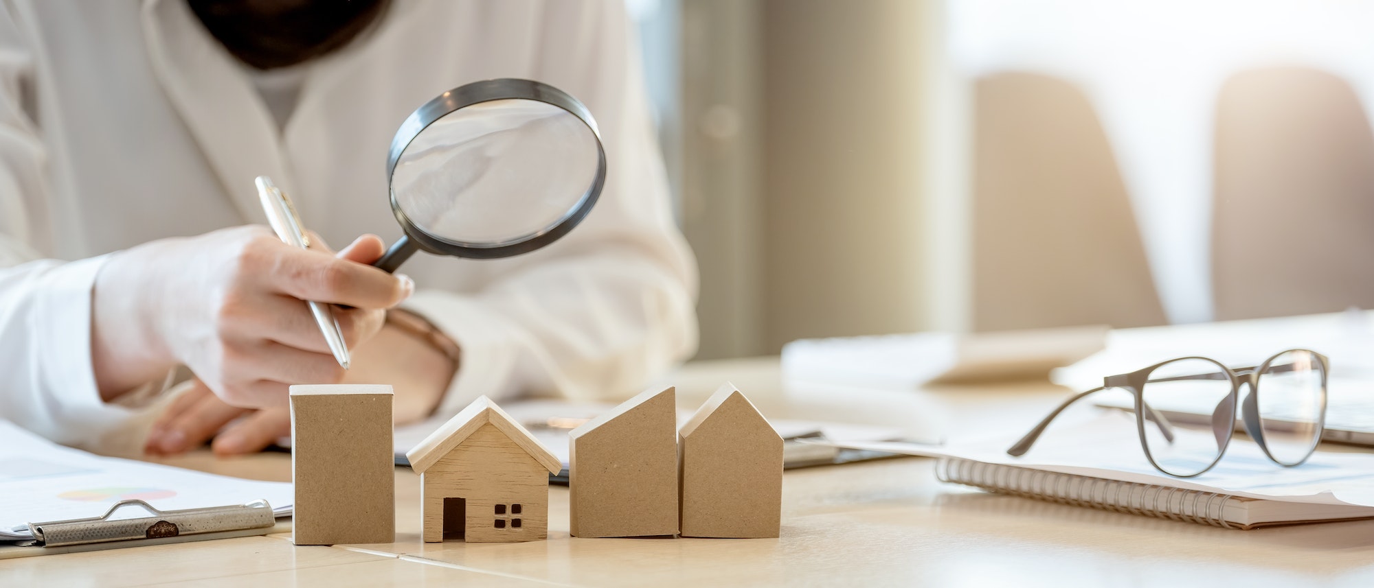 Looking for real estate agency, property insurance, mortgage loan or new house. Woman with