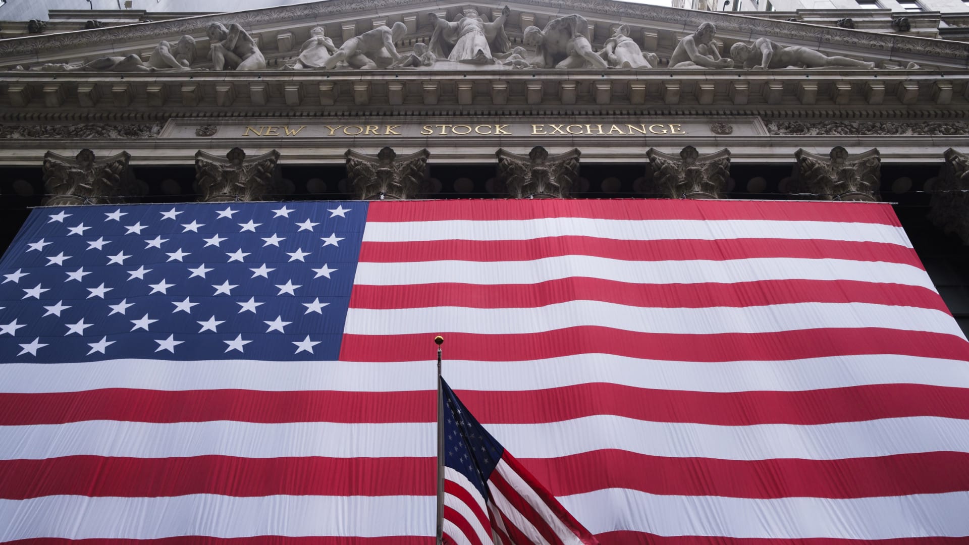 Wall Street a progressé avec des pertes sous la pression de l'inflation.