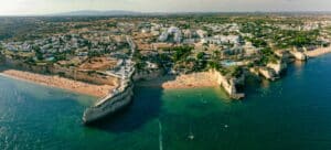 Aerial drone panoramic views of Praia Nova and Praia de Nossa, Algarve, Portugal