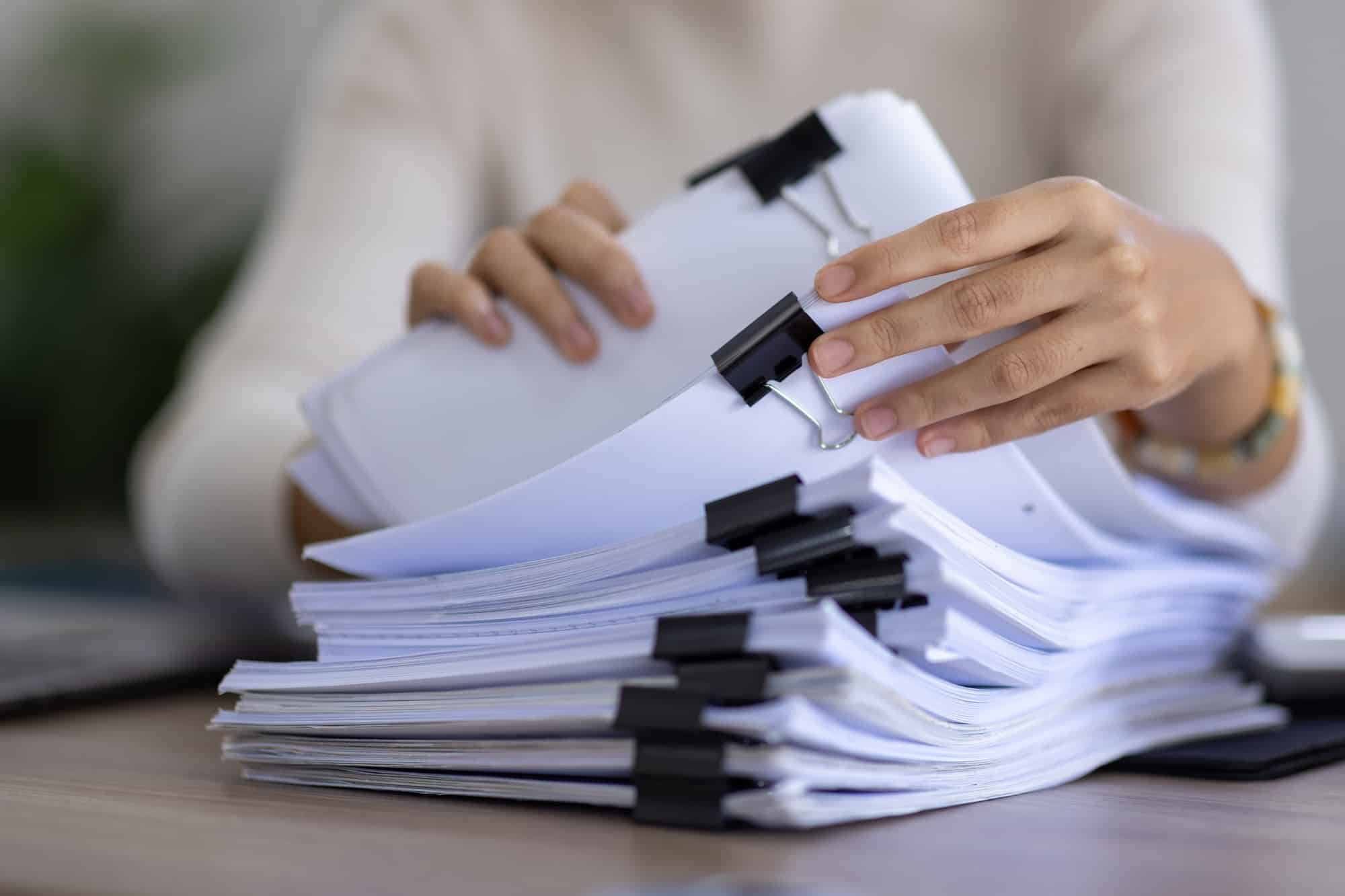 Business Documents, Auditor businesswoman checking searching document legal prepare paperwork or rep