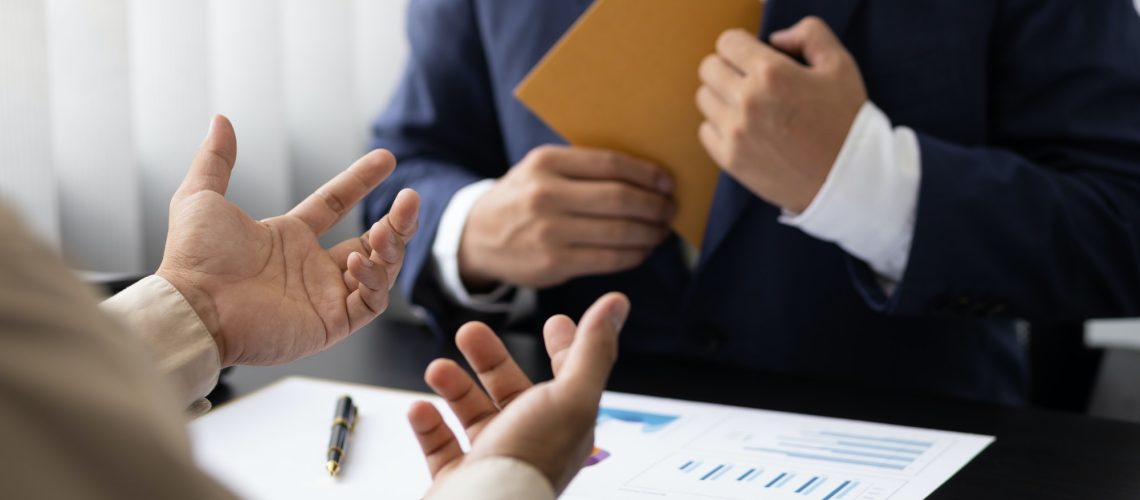 Business people get paid wages or salaries. Bribery signing concept.